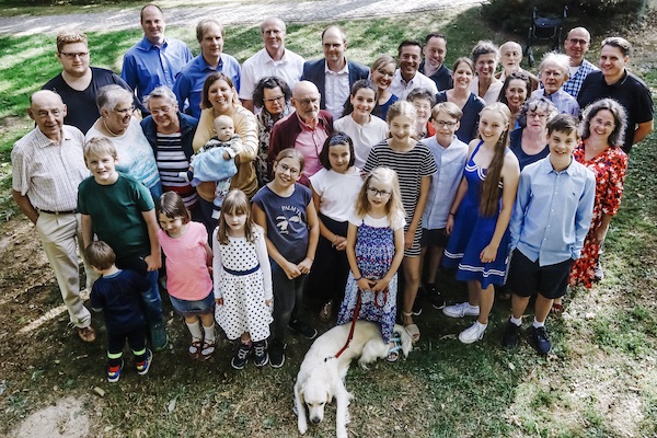 Family group looking up at camera