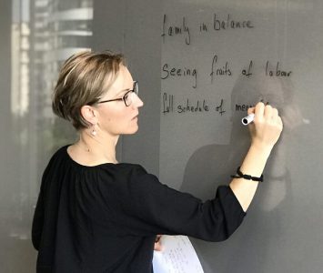 Anna_writing_glass_board